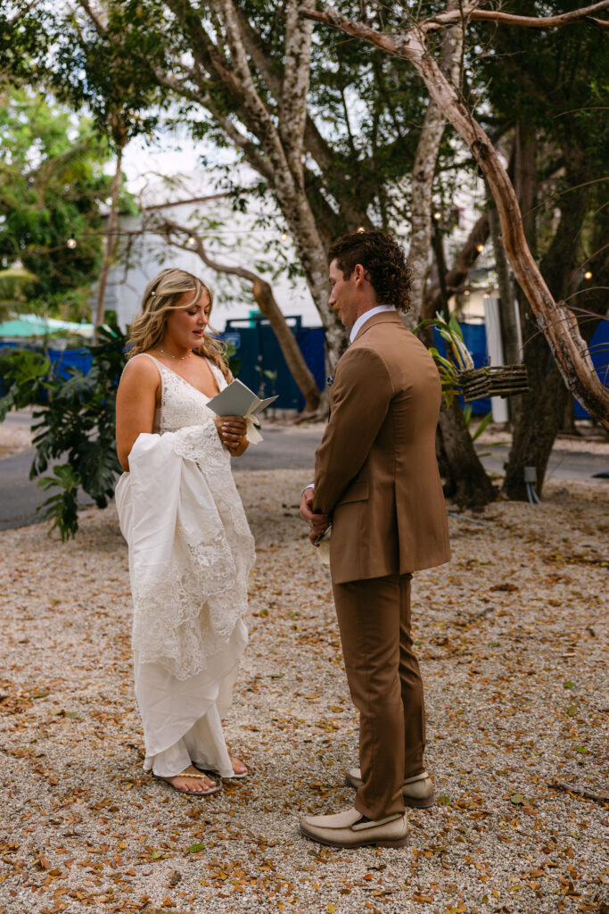 Spring oceanside private vow candids during a Florida elopement