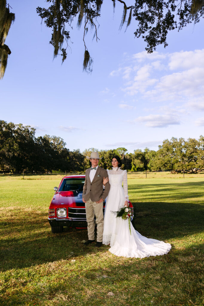 Western wedding ceremony at The Colonial At Sunset surrounded by oak trees and Old Florida scenery.