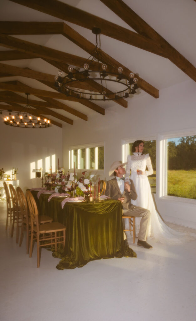 Western wedding couple photographed beneath oak trees at The Colonial At Sunset wedding venue in Florida.
