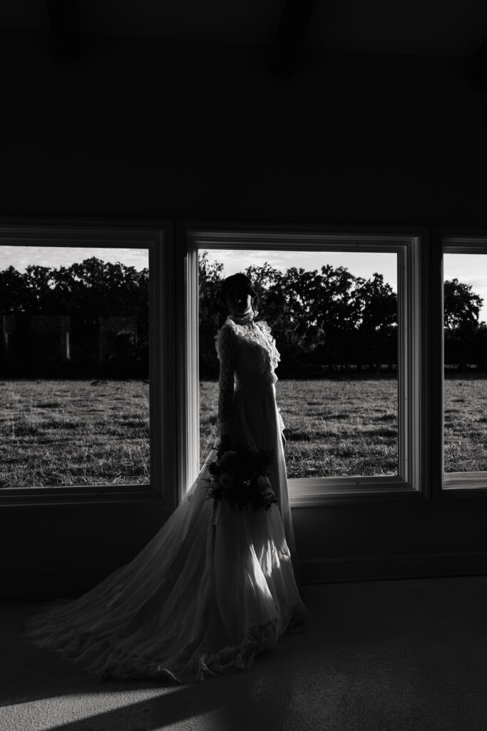 Bride and groom sharing a candid moment at their western wedding at The Colonial At Sunset in Florida.